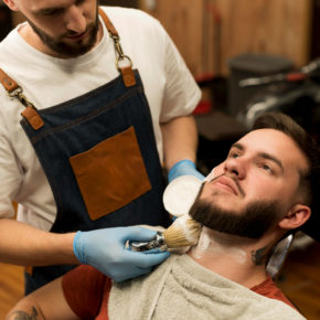 barber-using-shaving-cream-contour-male-customer-s-beard